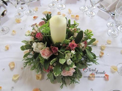 Candle table centres - of pale pinks, greens, ivory and dusky pinks